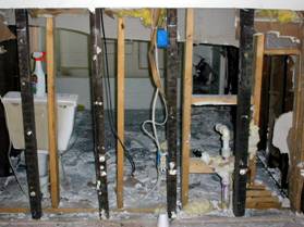 Proper cleaning after a flood requires stripping walls and floors and letting them dry thoroughly.